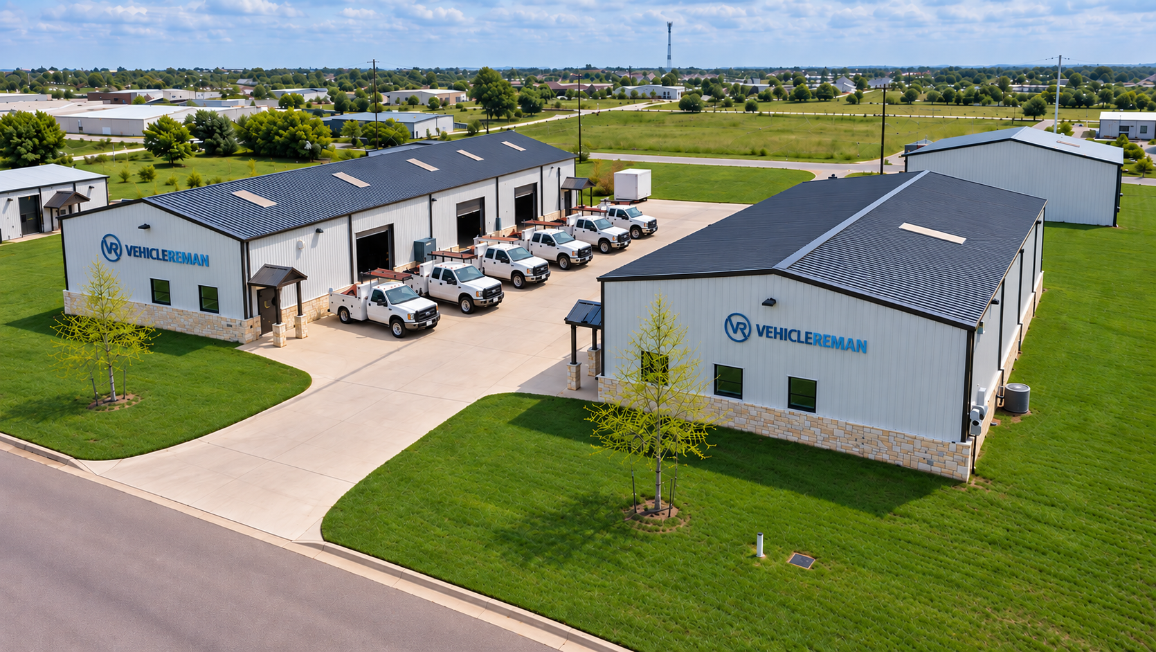 Vehicle Reman facility with commercial fleet trucks lined up outside
